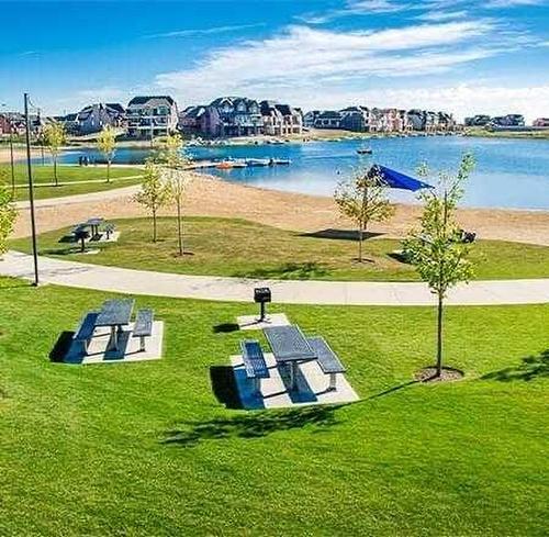 207-30 Mahogany Mews Se, Calgary, AB - Outdoor With Body Of Water With View