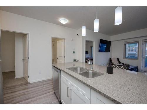 207-30 Mahogany Mews Se, Calgary, AB - Indoor Photo Showing Kitchen With Double Sink