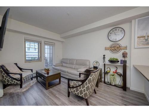 207-30 Mahogany Mews Se, Calgary, AB - Indoor Photo Showing Living Room