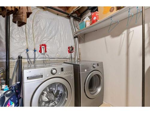 29 Sandpiper Link Nw, Calgary, AB - Indoor Photo Showing Laundry Room