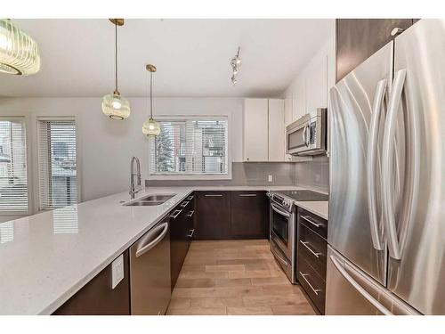 303-836 Royal Avenue Sw, Calgary, AB - Indoor Photo Showing Kitchen With Stainless Steel Kitchen With Double Sink With Upgraded Kitchen