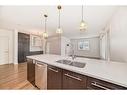 303-836 Royal Avenue Sw, Calgary, AB  - Indoor Photo Showing Kitchen With Double Sink 