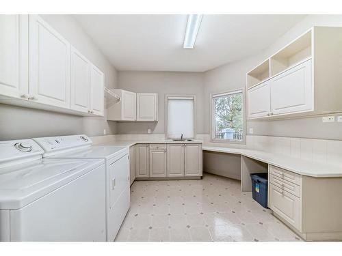 13007 Canso Place Sw, Calgary, AB - Indoor Photo Showing Laundry Room