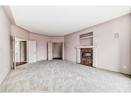 13007 Canso Place Sw, Calgary, AB - Indoor With Fireplace