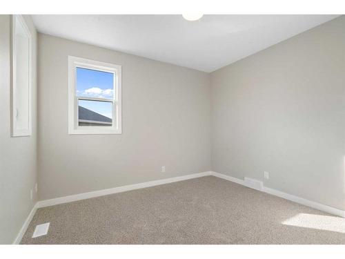 44 Verity Place Sw, Calgary, AB - Indoor Photo Showing Other Room