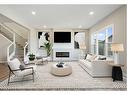 44 Verity Place Sw, Calgary, AB  - Indoor Photo Showing Living Room With Fireplace 