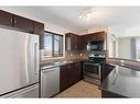 2401-60 Panatella Street Nw, Calgary, AB  - Indoor Photo Showing Kitchen With Double Sink 