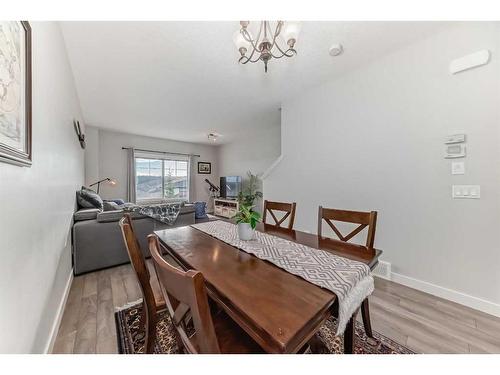 2406 Jumping Pound Common, Cochrane, AB - Indoor Photo Showing Dining Room