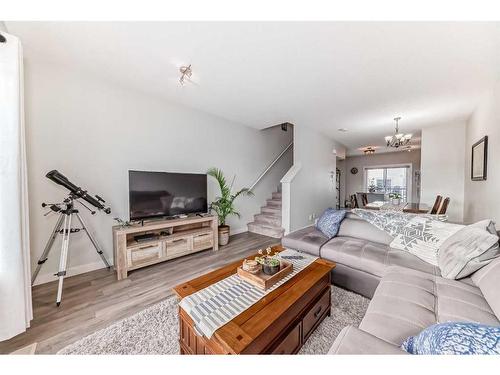 2406 Jumping Pound Common, Cochrane, AB - Indoor Photo Showing Living Room