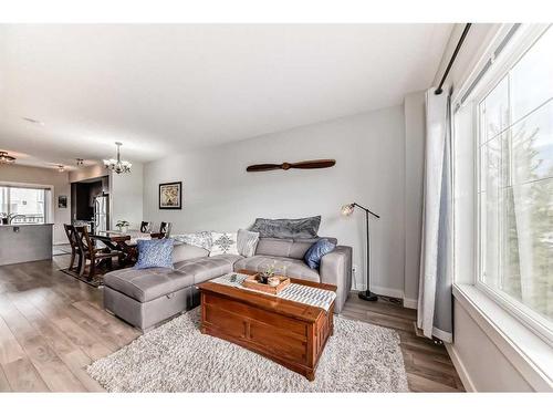 2406 Jumping Pound Common, Cochrane, AB - Indoor Photo Showing Living Room