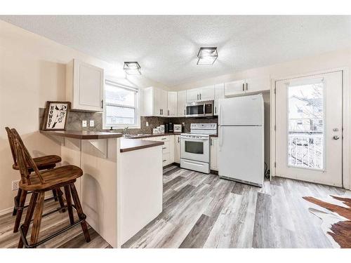 901 Prairie Sound Circle Nw, High River, AB - Indoor Photo Showing Kitchen