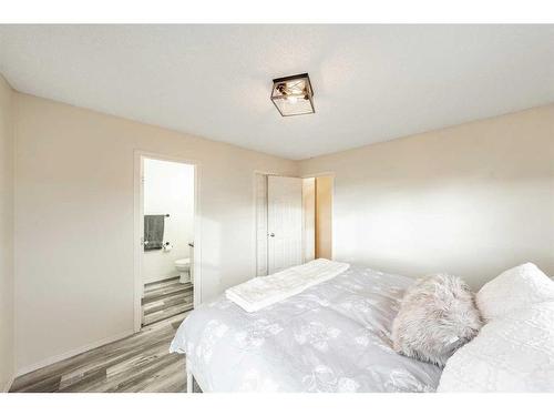 901 Prairie Sound Circle Nw, High River, AB - Indoor Photo Showing Bedroom