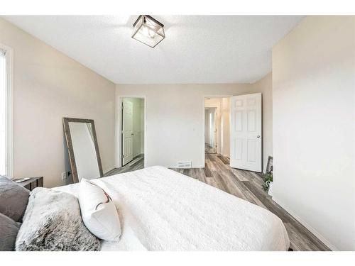 901 Prairie Sound Circle Nw, High River, AB - Indoor Photo Showing Bedroom