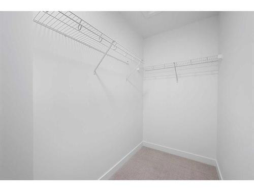 #208-857 Belmont Drive Sw, Calgary, AB - Indoor With Storage