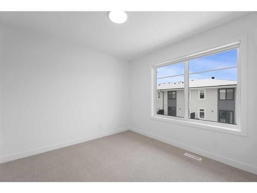 #208-857 Belmont Drive Sw, Calgary, AB - Indoor Photo Showing Other Room