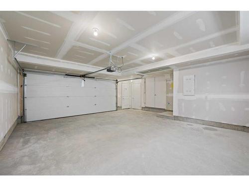 #208-857 Belmont Drive Sw, Calgary, AB - Indoor Photo Showing Garage