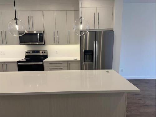 372 Carringvue Place Nw, Calgary, AB - Indoor Photo Showing Kitchen With Stainless Steel Kitchen With Upgraded Kitchen