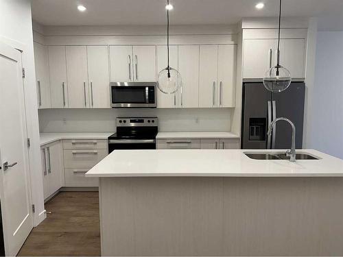 372 Carringvue Place Nw, Calgary, AB - Indoor Photo Showing Kitchen With Double Sink With Upgraded Kitchen