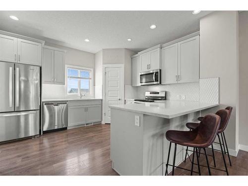 141 Sandstone Drive, Okotoks, AB - Indoor Photo Showing Kitchen With Stainless Steel Kitchen With Upgraded Kitchen