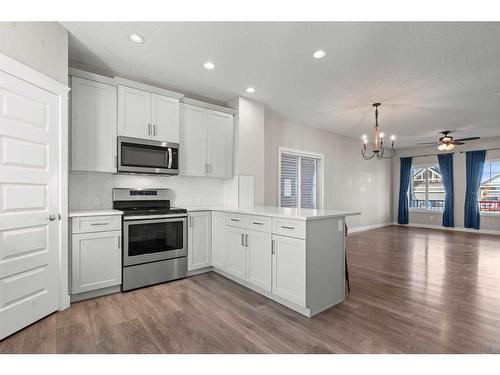 141 Sandstone Drive, Okotoks, AB - Indoor Photo Showing Kitchen