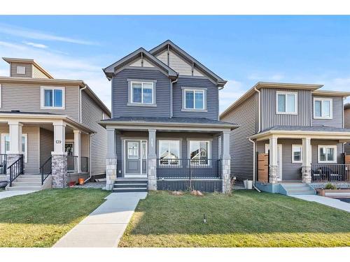 141 Sandstone Drive, Okotoks, AB - Outdoor With Deck Patio Veranda With Facade