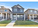 141 Sandstone Drive, Okotoks, AB  - Outdoor With Deck Patio Veranda With Facade 