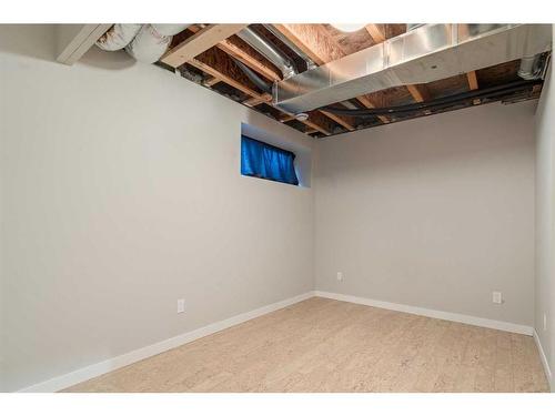 141 Sandstone Drive, Okotoks, AB - Indoor Photo Showing Basement