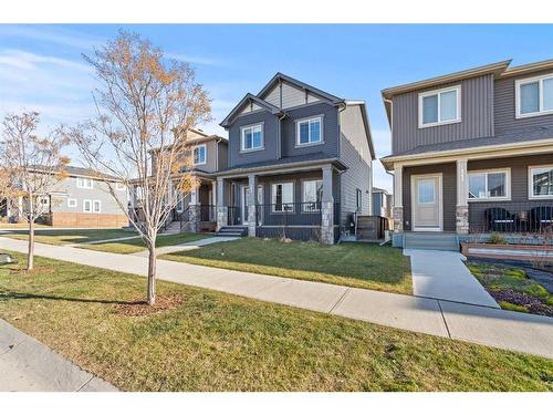 141 Sandstone Drive, Okotoks, AB - Outdoor With Deck Patio Veranda With Facade