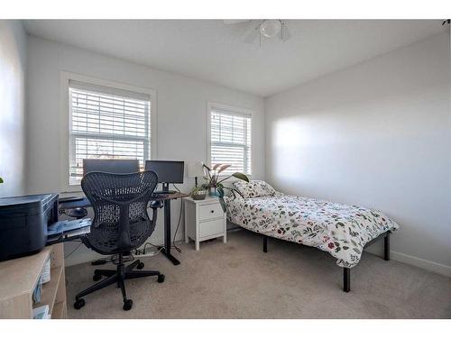 708 Hampshire Way Ne, High River, AB - Indoor Photo Showing Bedroom