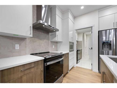 133 Corner Glen Road Ne, Calgary, AB - Indoor Photo Showing Kitchen With Upgraded Kitchen