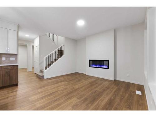 133 Corner Glen Road Ne, Calgary, AB - Indoor With Fireplace