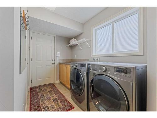 229 Cougar Ridge Drive Sw, Calgary, AB - Indoor Photo Showing Laundry Room