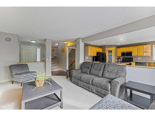 229 Cougar Ridge Drive Sw, Calgary, AB - Indoor Photo Showing Living Room