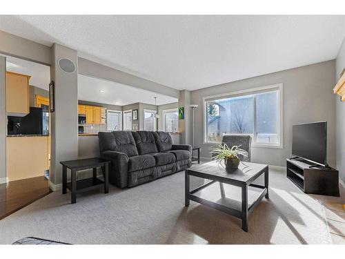 229 Cougar Ridge Drive Sw, Calgary, AB - Indoor Photo Showing Living Room