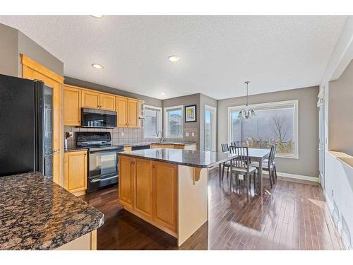 229 Cougar Ridge Drive Sw, Calgary, AB - Indoor Photo Showing Kitchen