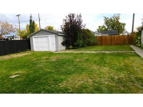 214 8 Street, Beiseker, AB - Outdoor With Backyard