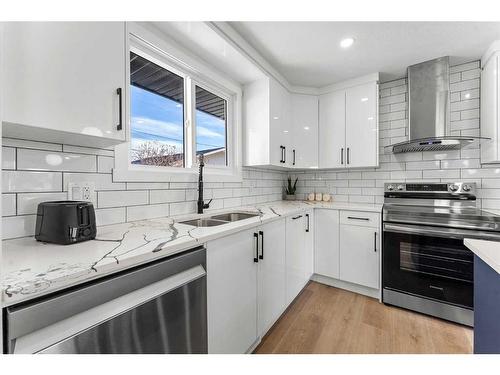 8020 Huntwick Hill Ne, Calgary, AB - Indoor Photo Showing Kitchen With Double Sink