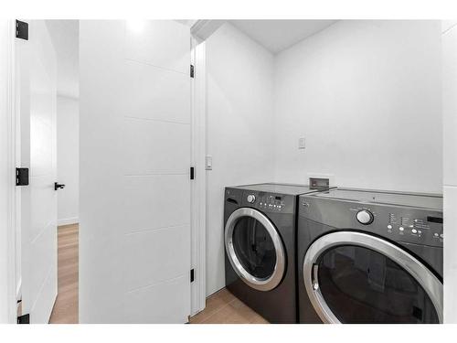 8020 Huntwick Hill Ne, Calgary, AB - Indoor Photo Showing Laundry Room