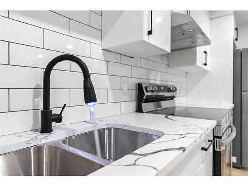 8020 Huntwick Hill Ne, Calgary, AB - Indoor Photo Showing Kitchen With Double Sink