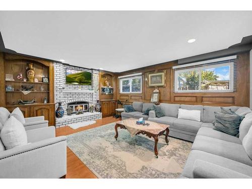 24 Templeson Place Ne, Calgary, AB - Indoor Photo Showing Living Room With Fireplace