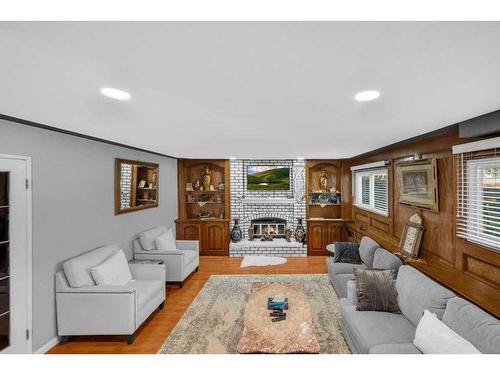 24 Templeson Place Ne, Calgary, AB - Indoor Photo Showing Living Room With Fireplace