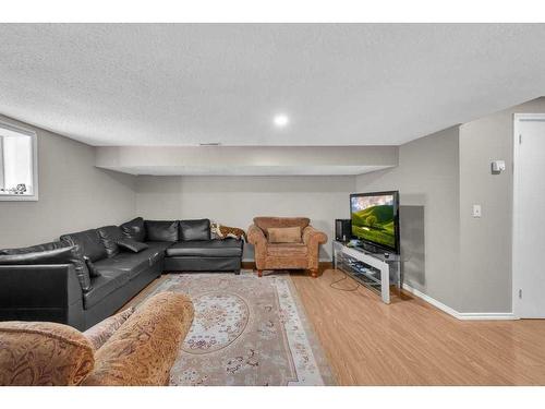 24 Templeson Place Ne, Calgary, AB - Indoor Photo Showing Living Room