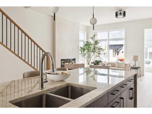 15 Sovereign Heights Sw, Calgary, AB - Indoor Photo Showing Kitchen With Double Sink