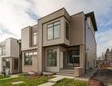 15 Sovereign Heights Sw, Calgary, AB  - Outdoor With Facade 