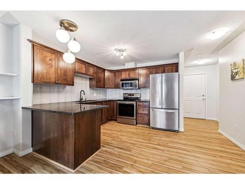 323-345 Rocky Vista Park Nw, Calgary, AB - Indoor Photo Showing Kitchen With Stainless Steel Kitchen