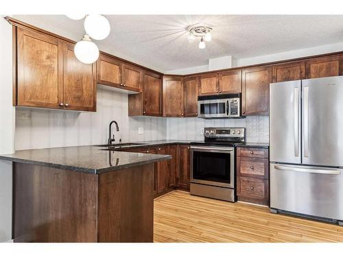 323-345 Rocky Vista Park Nw, Calgary, AB - Indoor Photo Showing Kitchen With Stainless Steel Kitchen