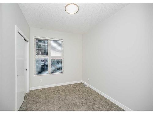 2403-95 Burma Star Road Sw, Calgary, AB - Indoor Photo Showing Other Room