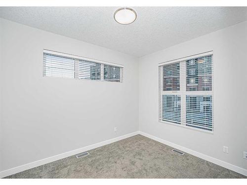 2403-95 Burma Star Road Sw, Calgary, AB - Indoor Photo Showing Other Room