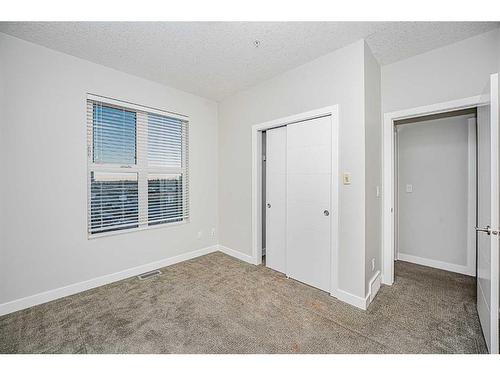 2403-95 Burma Star Road Sw, Calgary, AB - Indoor Photo Showing Other Room