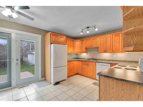 2442 Elmwood Drive Se, Calgary, AB - Indoor Photo Showing Kitchen With Double Sink